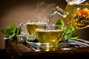green tea pot and cups